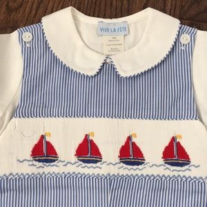 Size 12 mos smocked shortall